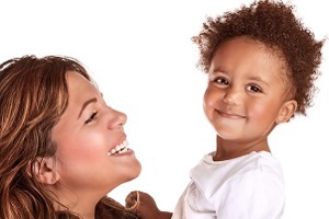 Woman with child both looking happy