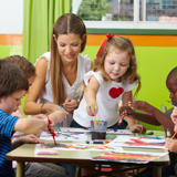 Children painter at a table