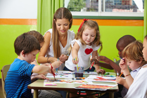 Children painter at a table