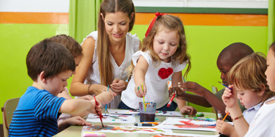 Children painter at a table