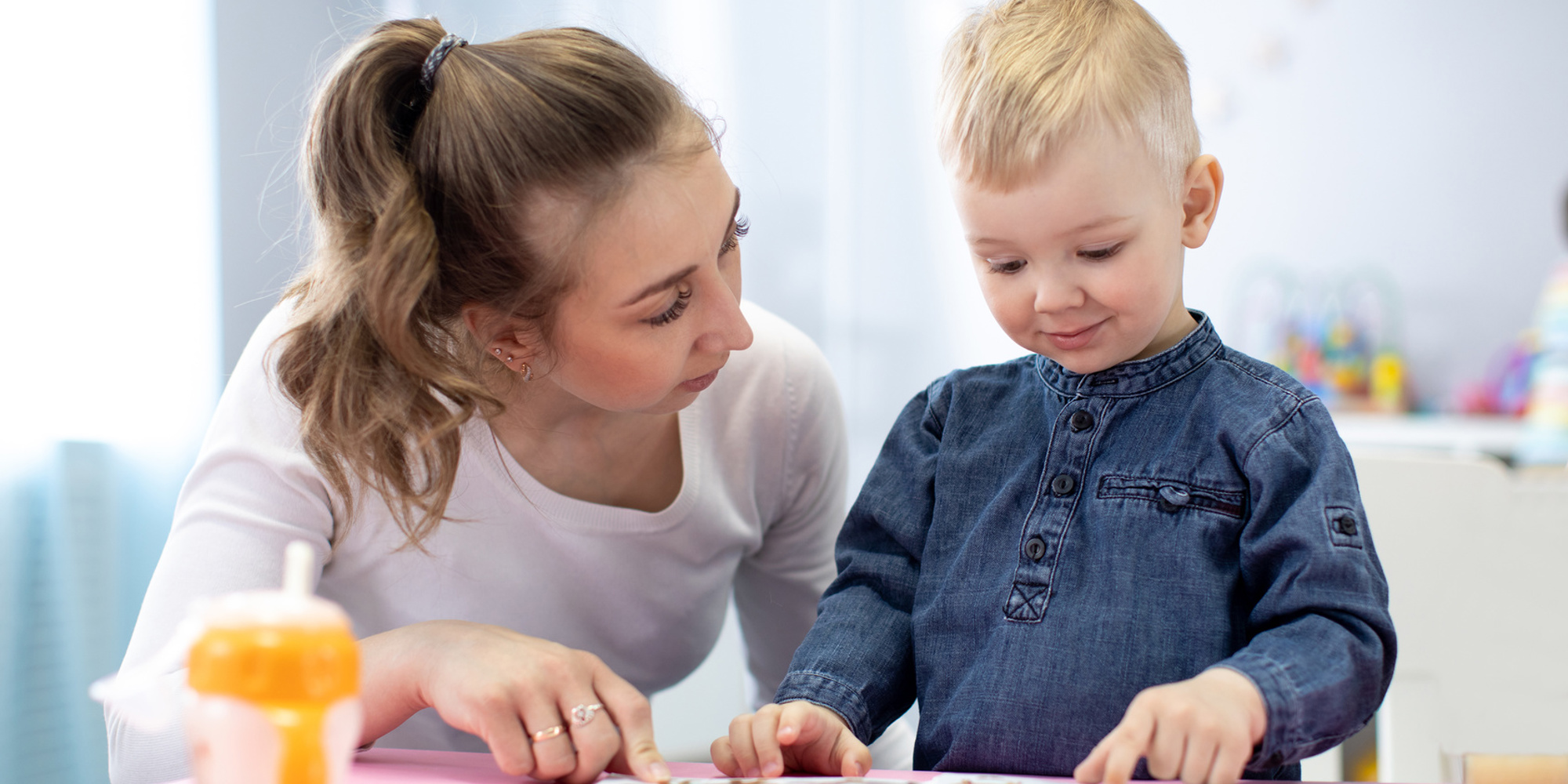 Adult reading with young child