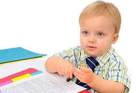 Young boy with and pen