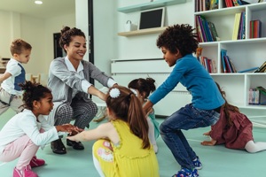 Young children playing in a nursery